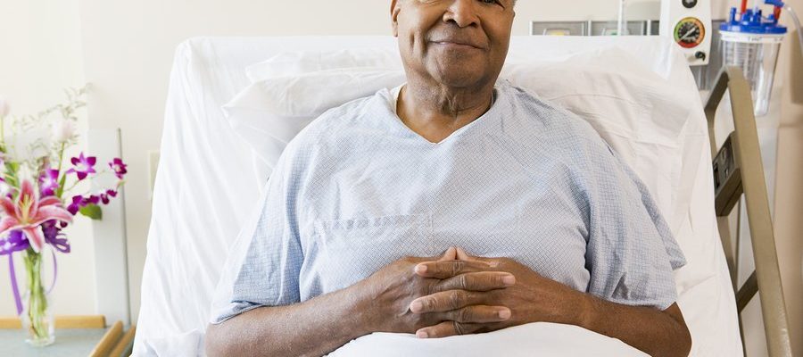 bigstock-Senior-Man-Sitting-In-Hospital-13886003